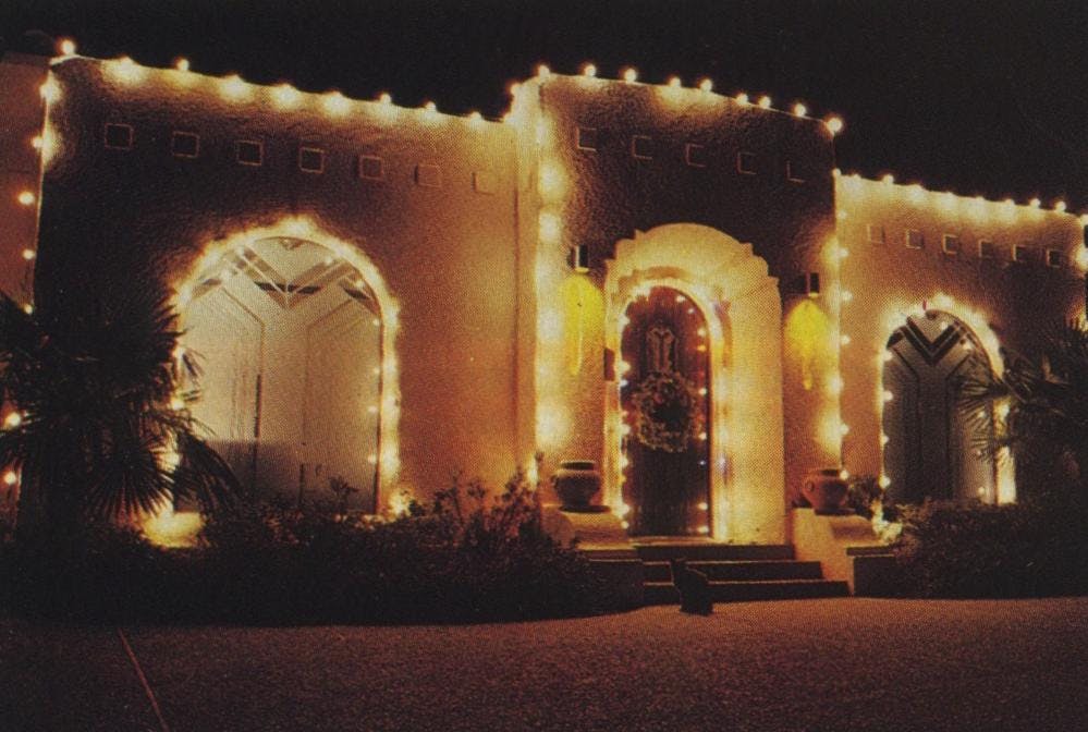 Pat Brooks, an art deco hound, thinks her Fort Worth house with its white lights looks like a pavilion at the 1939 World’s Fair. Last year she decided to decorate only a few days before Christmas. She actually finds Christmas depressing.