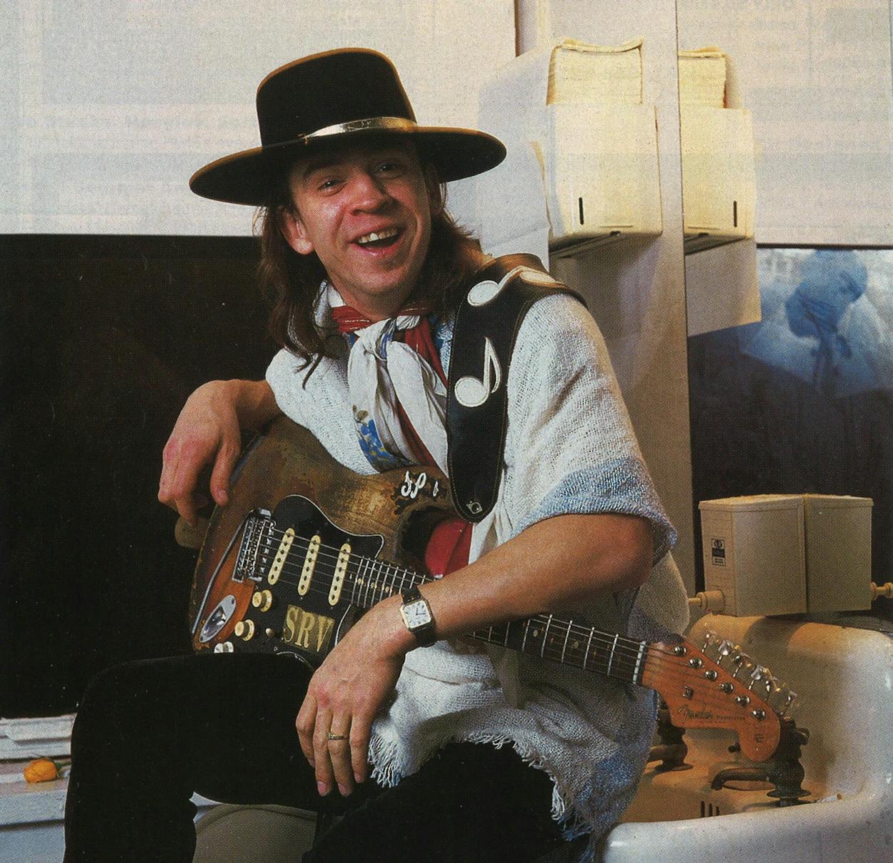 Stevie Ray Vaughan with his guitar.