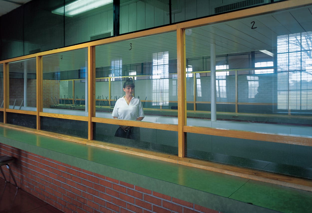 Darlene Routier maintaining her innocence behind shatterproof glass at the Mountain View Unit in Gatesville.