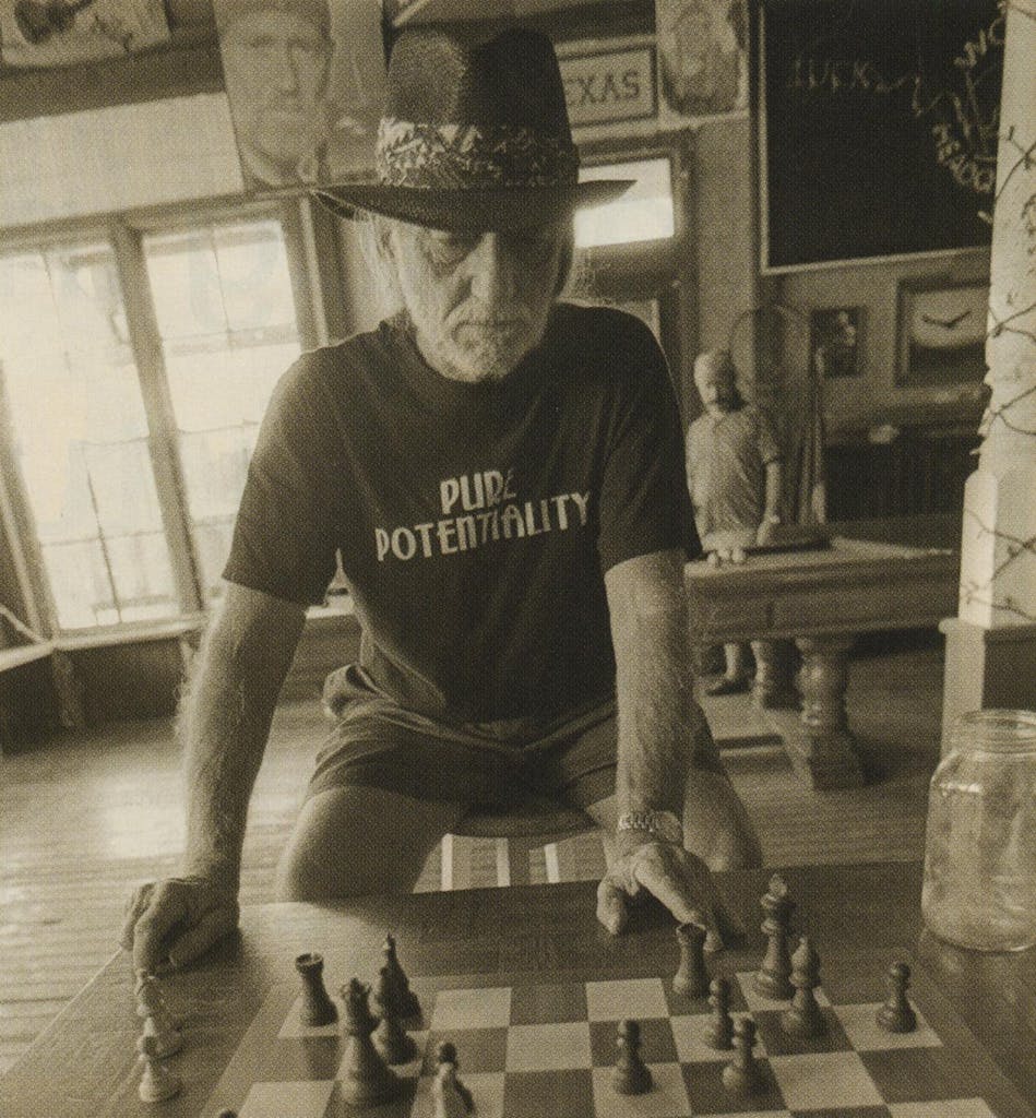 Chairman of the Board: Playing chess at his compound in Luck.