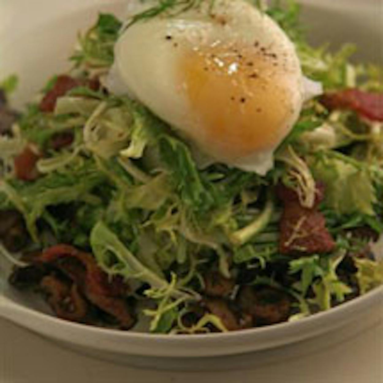 Chicory Frisee And Bacon Lardon Salad Texas Monthly