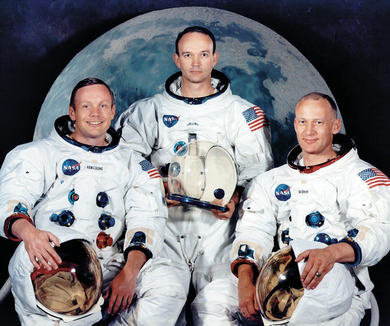 Armstrong, Michael Collins, and Aldrin pose for an official NASA portrait. 