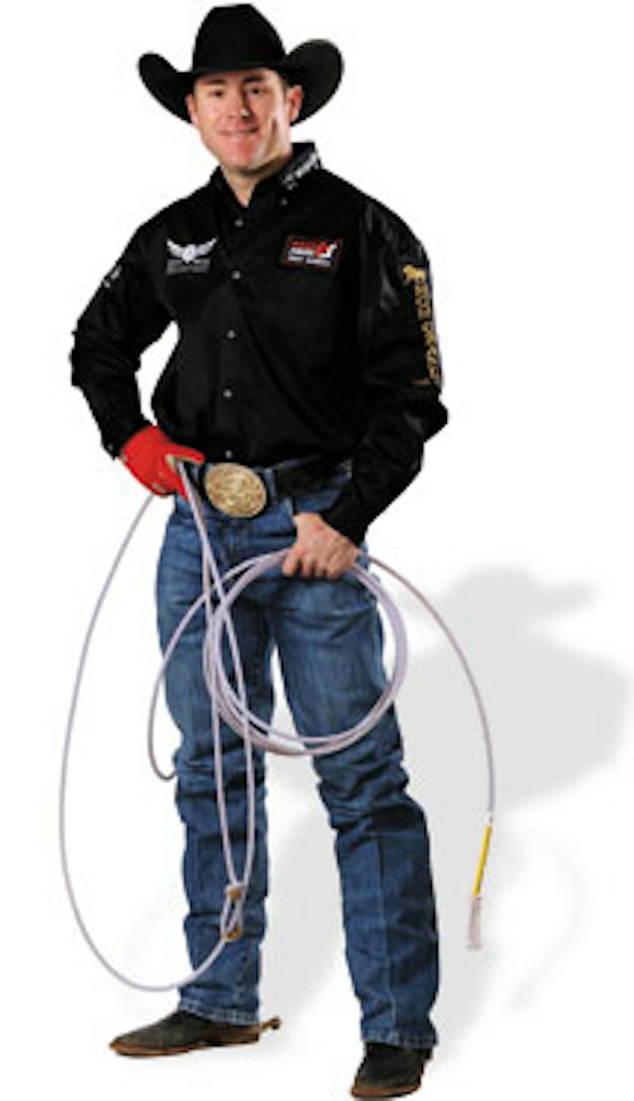 Rode Cowboy Trevor Brazile with a lasso, black button down, and cowboy hat.