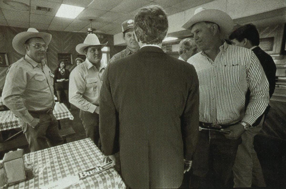 Like his father, Bush gets an adrenaline rush when he's out campaigning. Making his pitch to some farmers and ranchers at a barbecue joint in Uvalde.