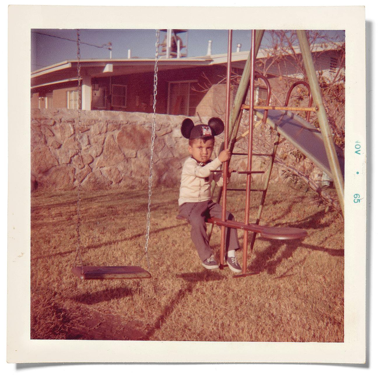 The author playing on his swing set in El Paso in 1965.