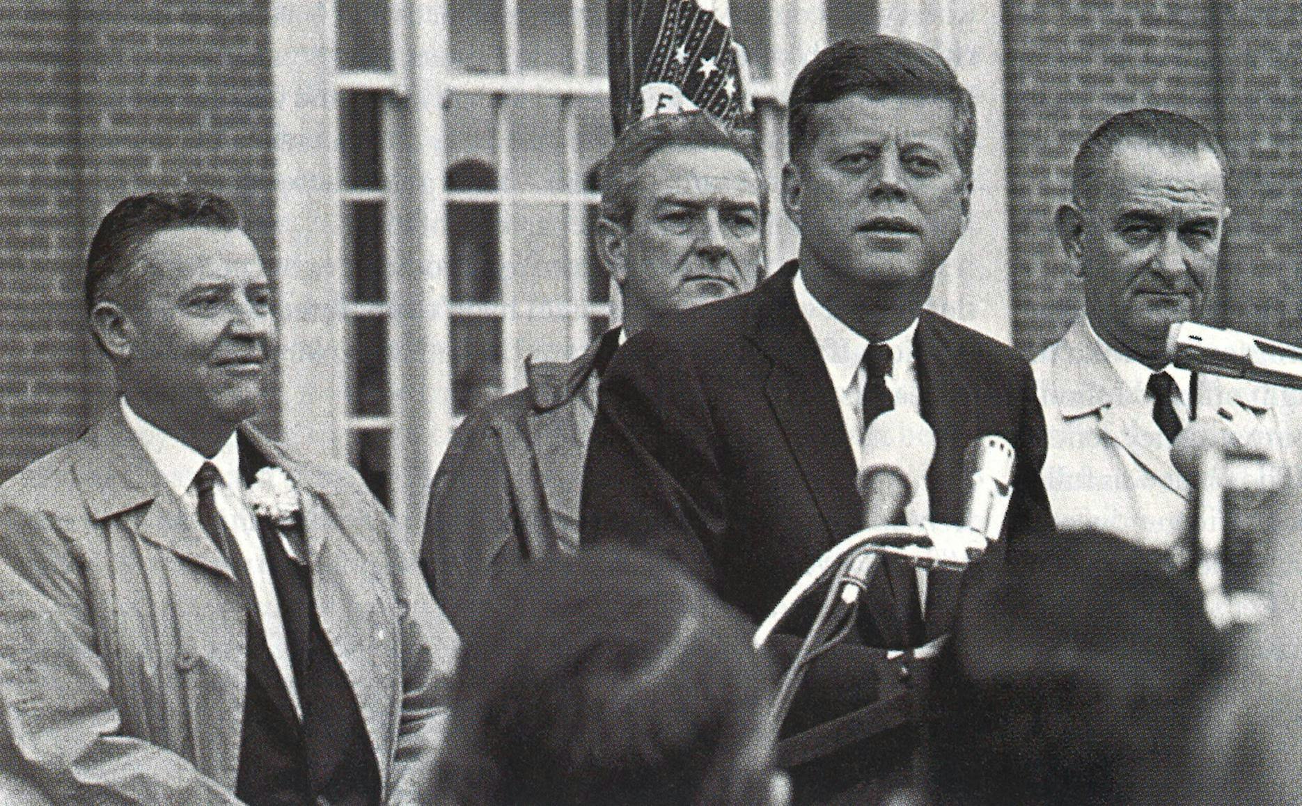 Texas senator Ralph Yarbrough (far left, next to John Connally) listens a speech in Fort Worth during Kennedy's trip to Texas. The media reported that Yarborough refused to ride in the same car as Johnson in a motorcade, and LBJ commented that the "newspaper boys went wild. It was the biggest [thing] ever since de Gaulle farted."