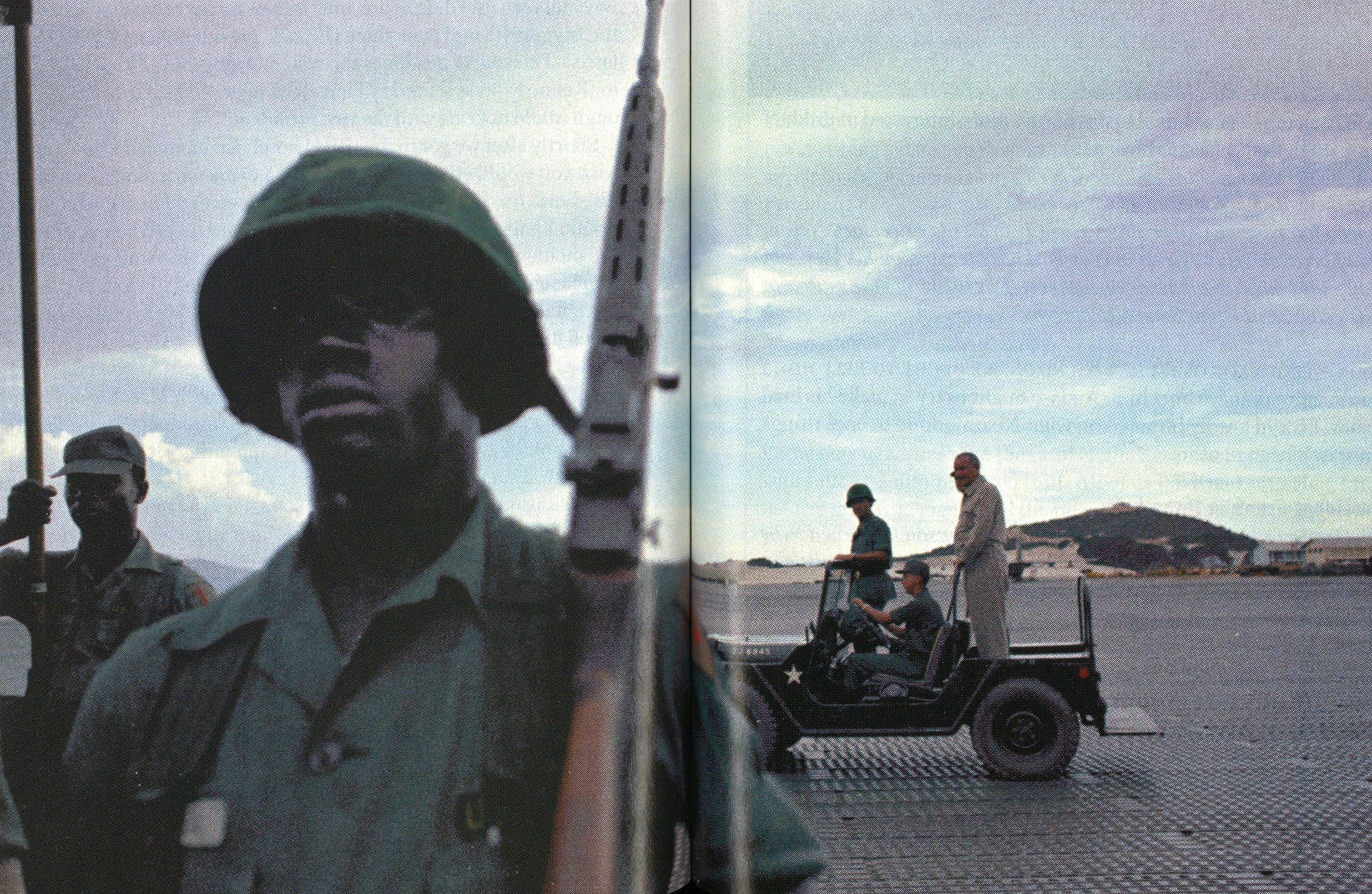 Johnson (standing in the Jeep) visits Cam Ranh Bay, South Vietnam, in October 1966 to help boost the morale of the troops.