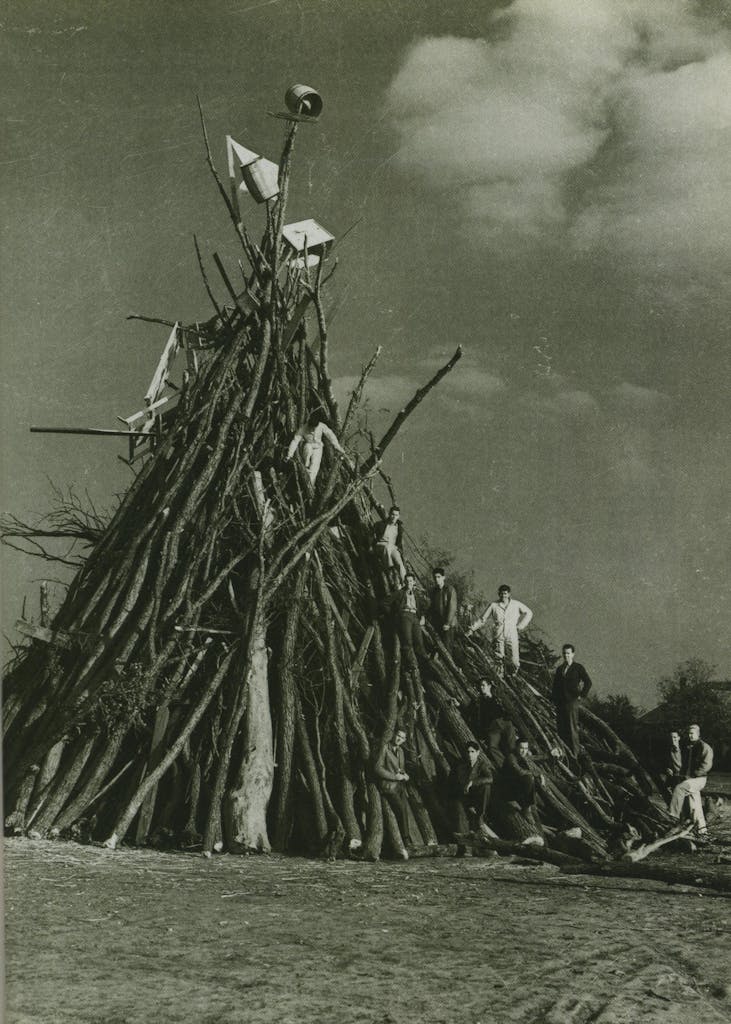 Aggies posing on the Texas A&M Bonfire in 1939. 
