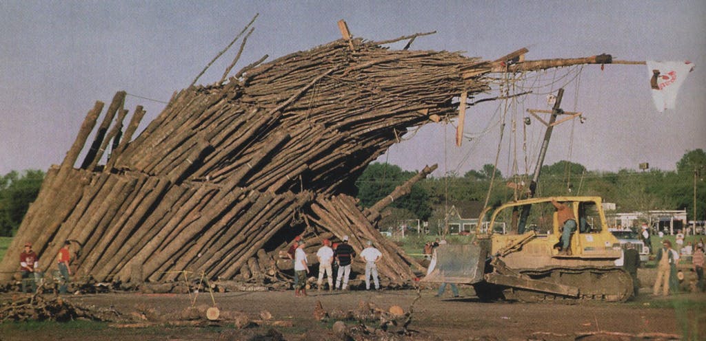 The 1994 Texas A&M Bonfire leaning significantly after heavy rains. 
