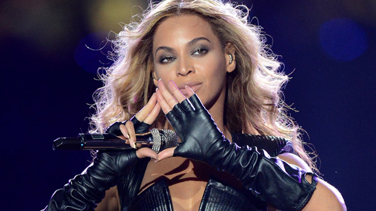 Beyoncé doing Illuminati sign.