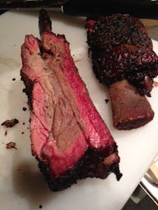 Closeup of Beef chuck rib with a smoke ring. 