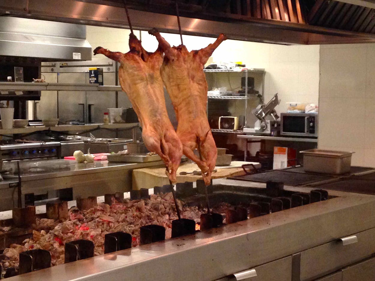 Cabrito's hang in a restaurant's kitchen.