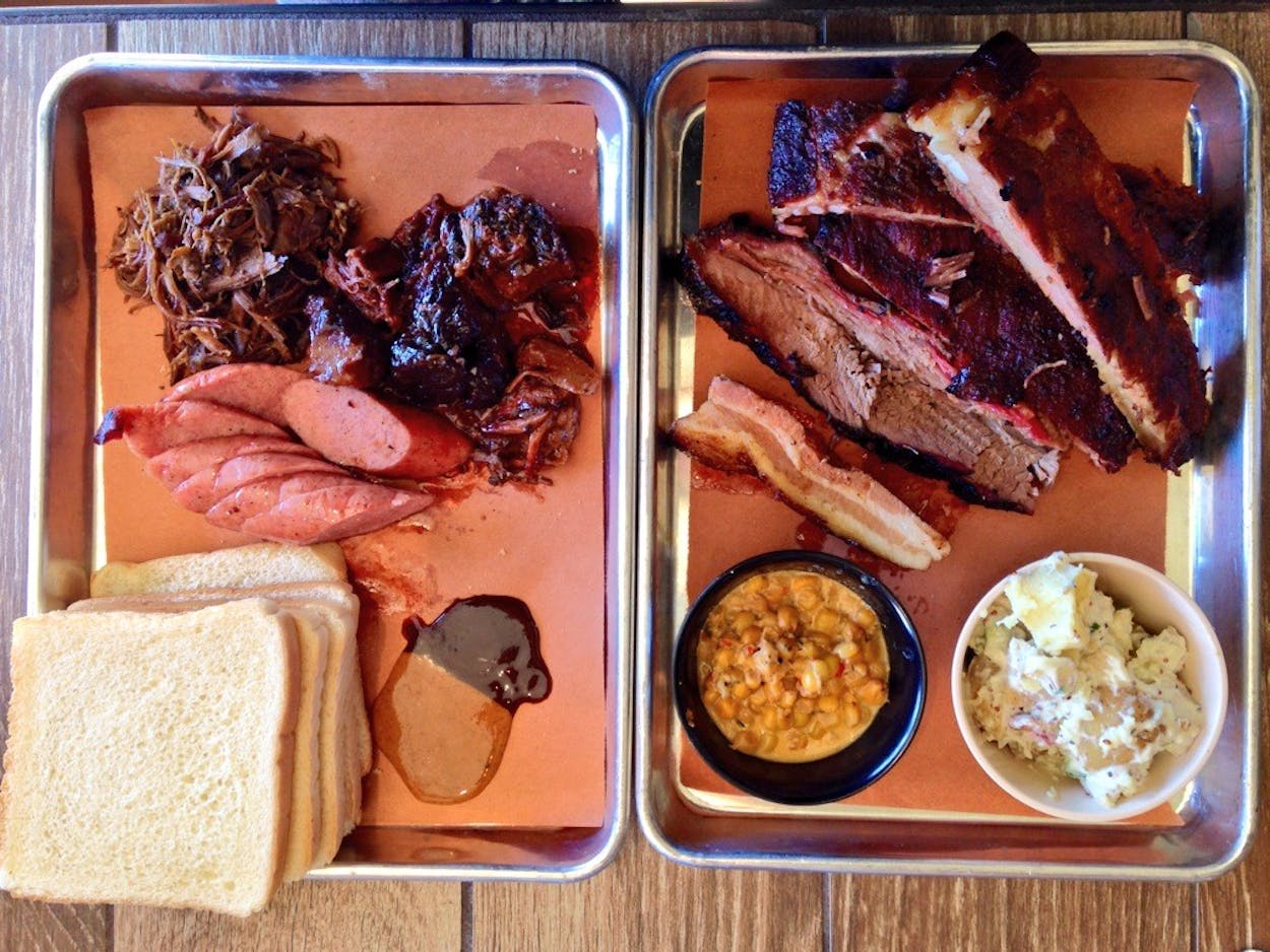 Two full trays of barbecue.