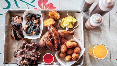 BBQ Tray with a chicken and hushpuppies from Salvage BBQ.