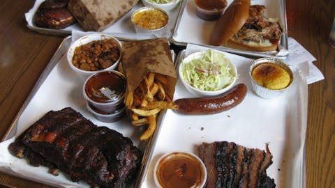 Four loaded BBQ Trays from Smoque