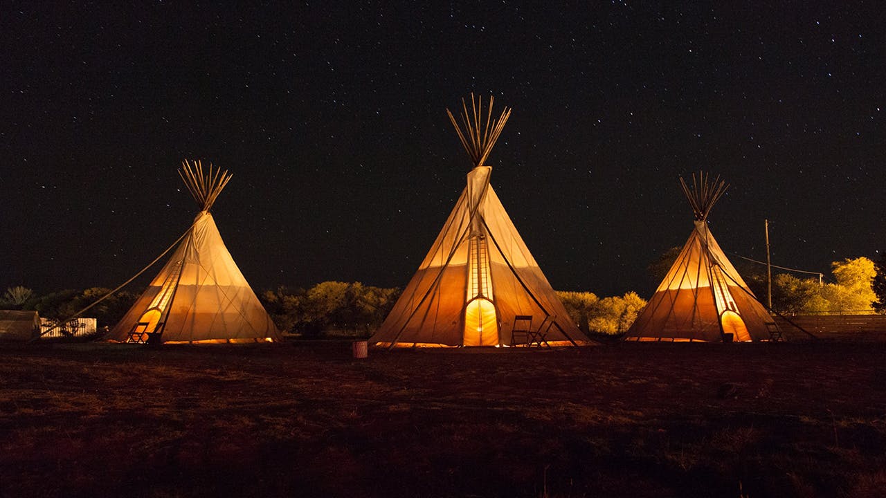 Spend the night in a tepee at El Cosmico.