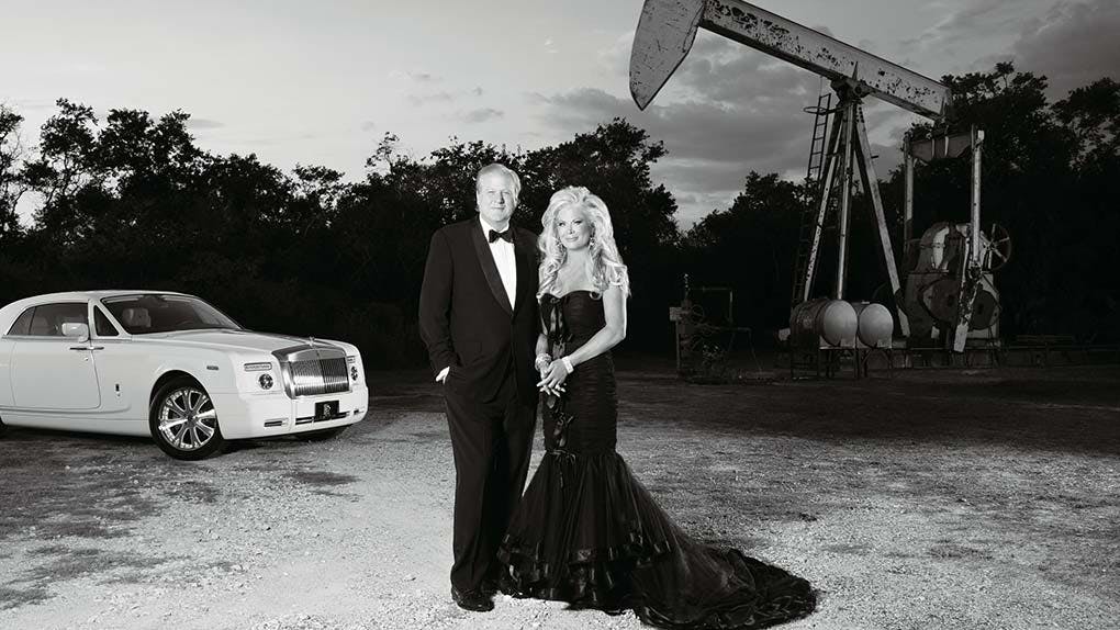 Theresa and Lamar Roemer with one of their rigs and Rolls-Royce. 
