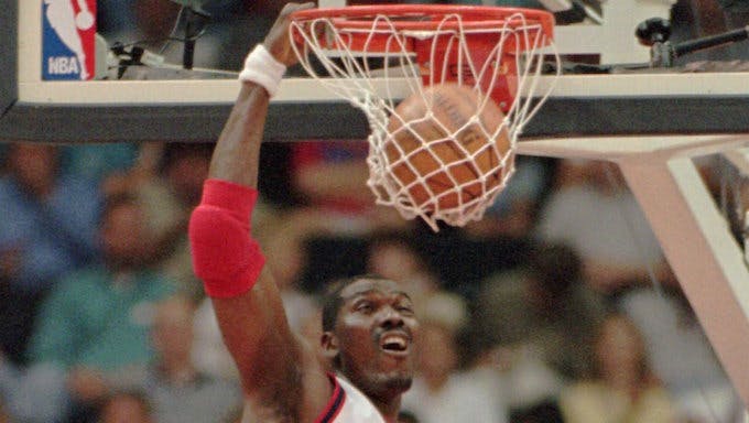 Hakeem Olajuwon would like to sell you some sneakers, please