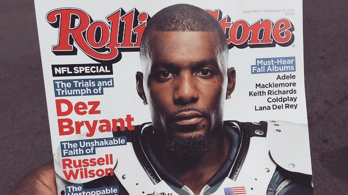 Dez Bryant takes photo with fan who has a Dez Bryant hand tattoo