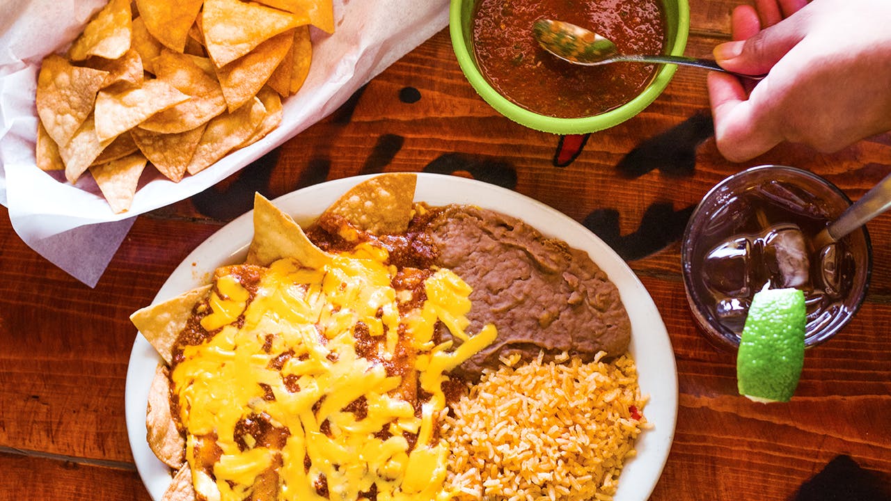 Dig into a plate of chili cheese enchiladas at Julia's Restaurant. 