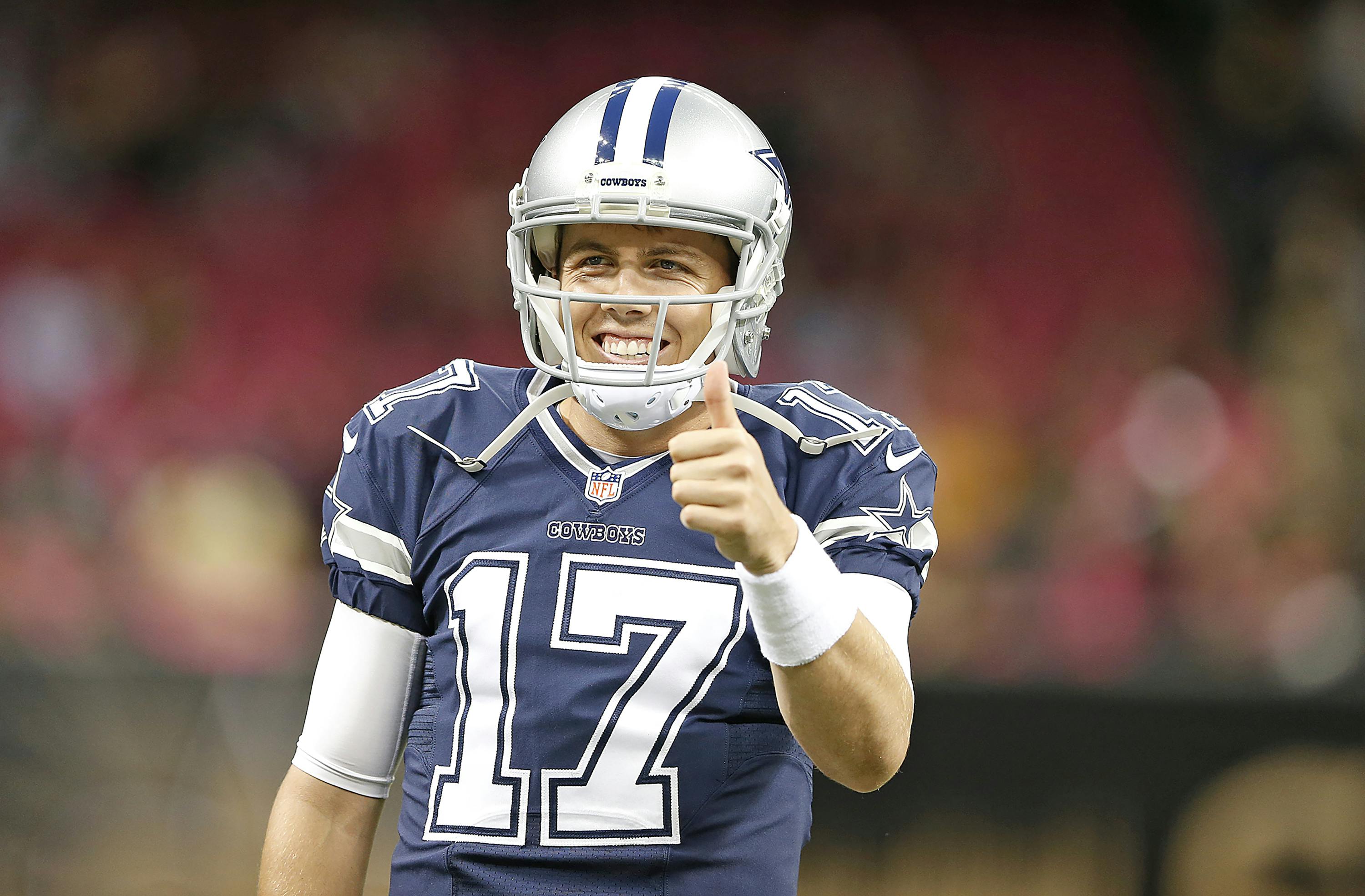 Dallas Cowboys quarterback Kellen Moore (17) gives a thumbs up before an NFL game against the New Orleans Saints at the Mercedes Benz Superdome in New Orleans, Louisiana, Sunday, October 4, 2015.   The Saints defeated the Cowboys in overtime, 26-20.  (James D. Smith via AP)