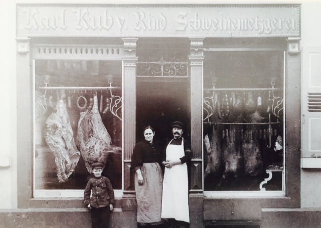 Karl Kuby Jr.'s great grandparents and grandfather (as a child) in front of their butcher shop in Germany circa 1904. Photo provided by Karl Kuby Jr.