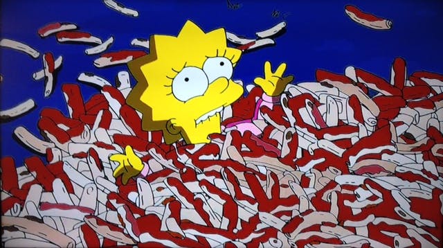 Simpsons still of Lisa buried in discarded BBQ rib bones. 