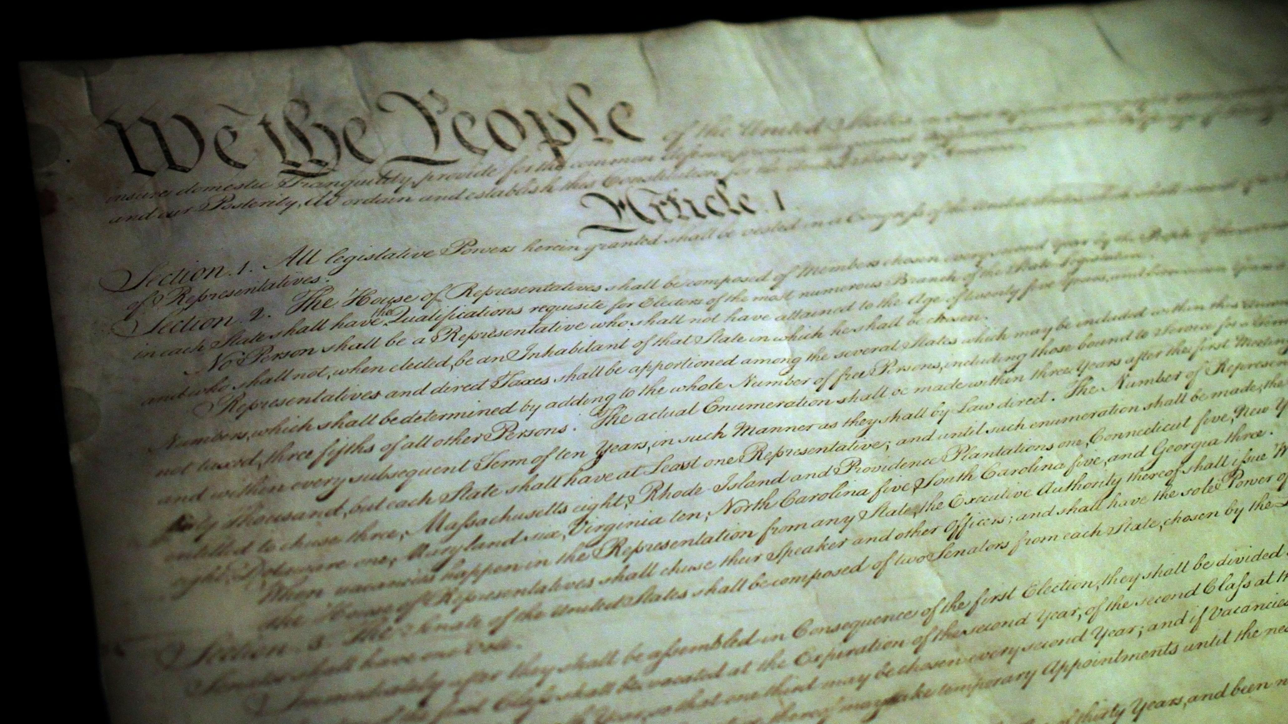 The preamble and beginning of the original Constitution in the rotunda of the National Archives in Washington, D.C.