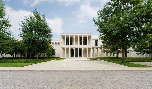 Front view of Texas mansion on Strait Lane in Dallas. 