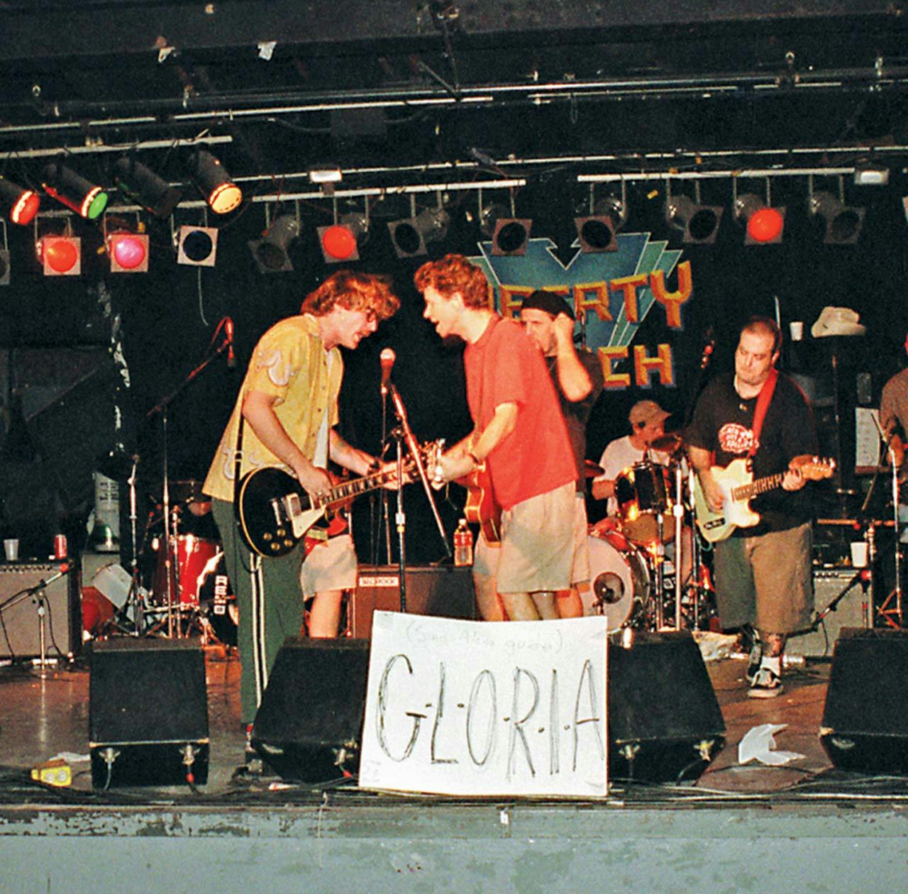 The author (wearing a red shirt) performing at the Gloriathon at Liberty Lunch in 1999.