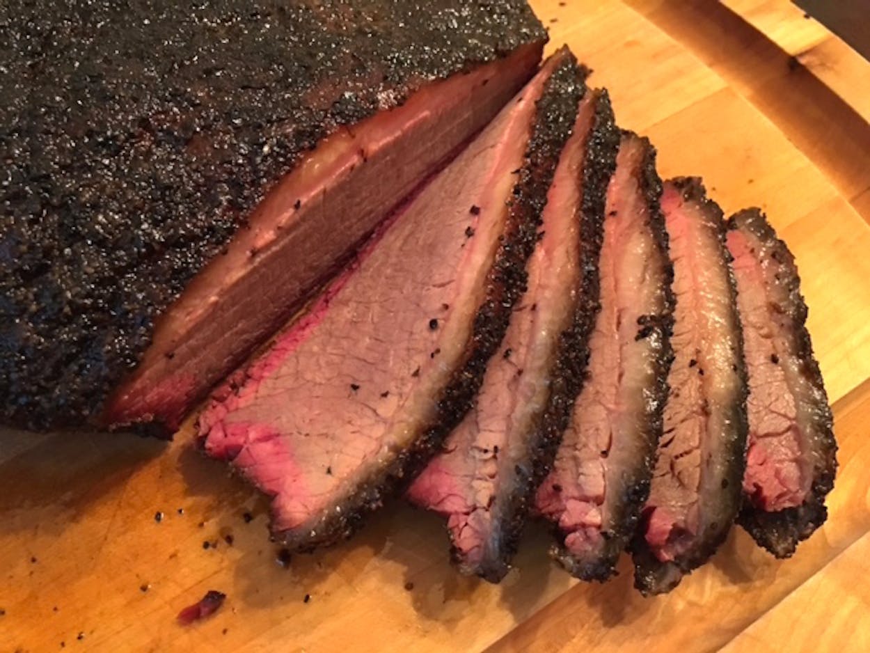 https://img.texasmonthly.com/2016/04/Cooler-Brisket-10.jpg?auto=compress&crop=faces&fit=fit&fm=jpg&h=0&ixlib=php-3.3.1&q=45&w=1250
