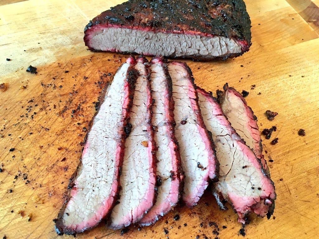 Dry brisket with a pink smoke ring. 