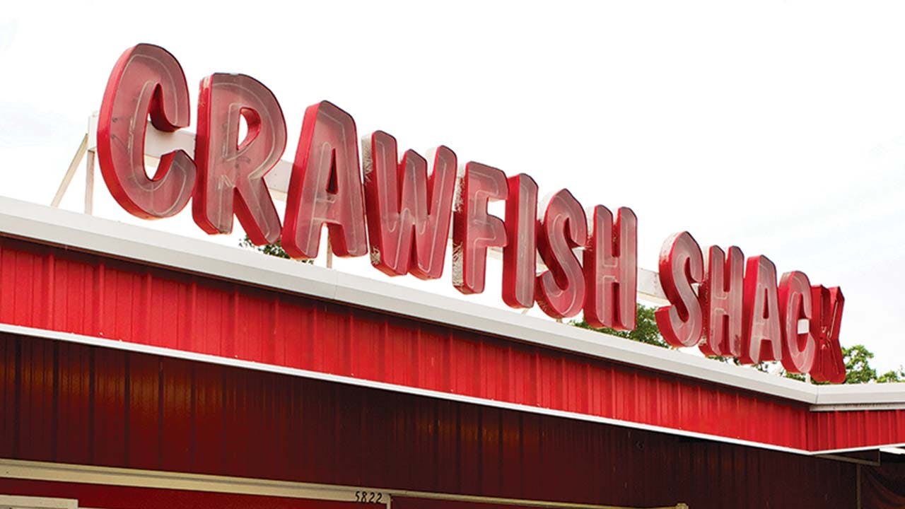 feature-crawfish-shack-sign-sky