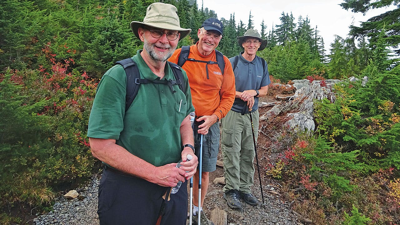 The author with his brothers, Jim and Tommy, on the trail to the Pilchuck summit.