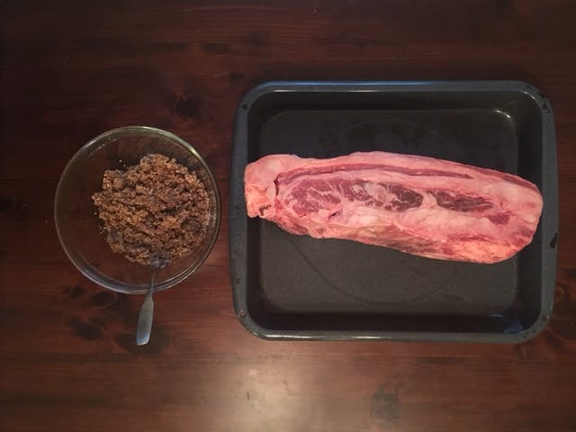 Slab of beef belly and a dry rub. 