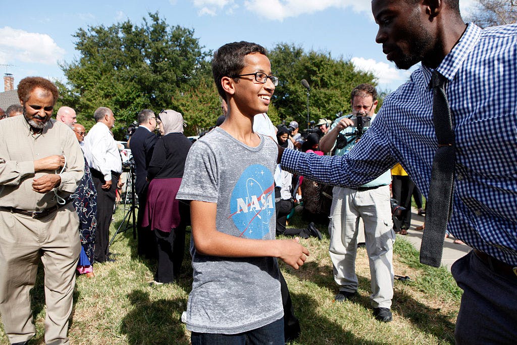 4-year-old Ahmed Ahmed Mohamed is greeted by a supporter during a news conference on September 16, 2015 in Irving, Texas. Mohammed was detained after a high school teacher falsely concluded that a homemade clock he brought to class might be a bomb.