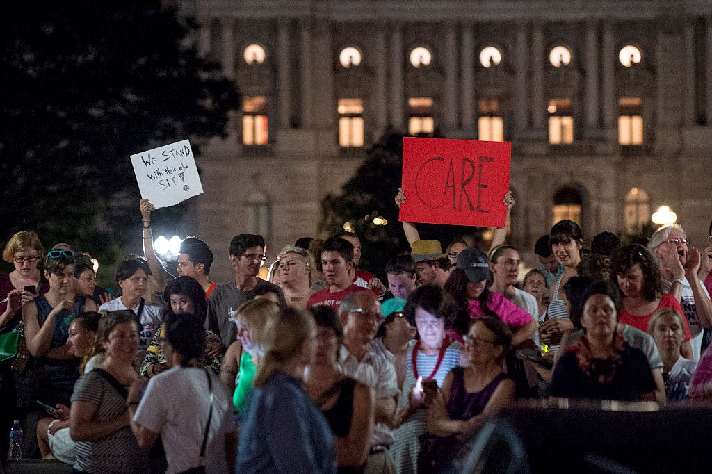 Supporters of House Democrats taking part in a sit-in on the House Chamber shout encouragement from outside the U.S. Capitol on June 22, 2016 in Washington, DC. 