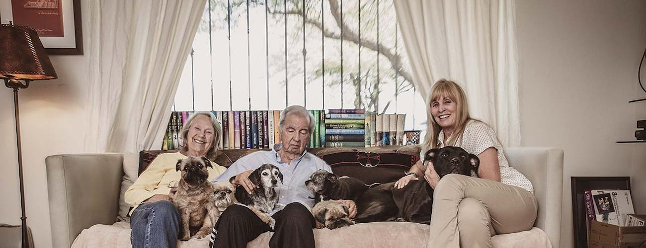 McMurtry with his wife, Faye Kesey (left), and writing partner Ossana, as well as the six dogs with whom they share a home in Tucson.