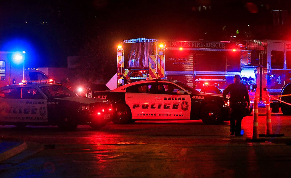 Dallas police work near the scene where eleven Dallas police officers were shot and five have now died on July 8, 2016 in Dallas, Texas. According to reports, shots were fired during a protest being held in downtown Dallas in response to recent fatal shootings of two black men by police - Alton Sterling on July 5, 2016 in Baton Rouge, Louisiana and Philando Castile on July 6, 2016, in Falcon Heights, Minnesota. Ron Jenkins/Getty