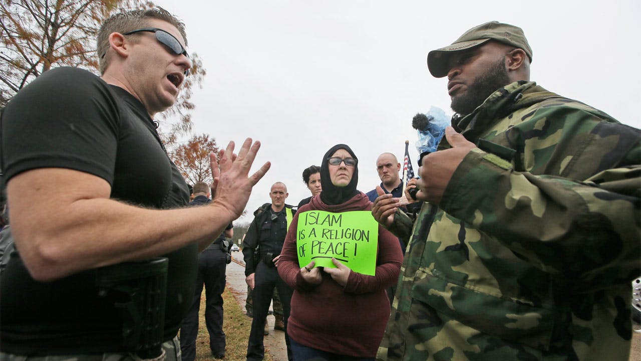David Wright (left), founder of the Bureau of American-Islamic Relations, at a protest in Richardson.