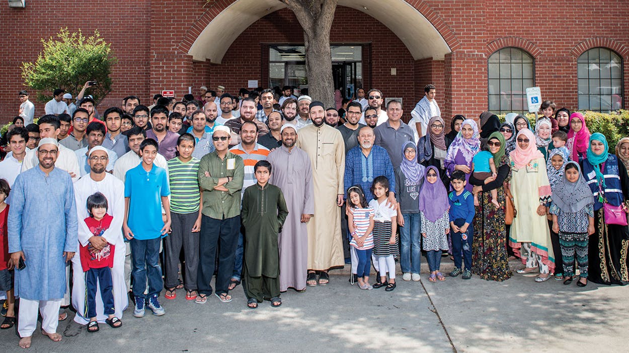 Members of the Valley Ranch Islamic Center in front of their mosque.