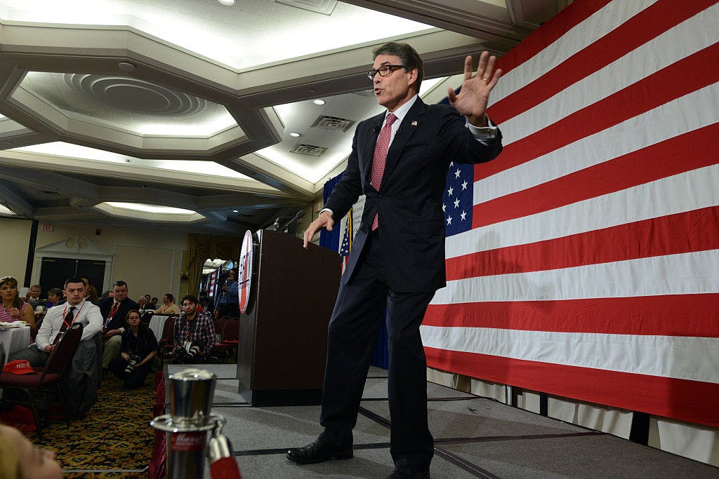 Former Texas Gov. Rick Perry does the boogie-woogie at the First in the Nation Republican Leadership Summit April 17, 2015 in Nashua, New Hampshire.