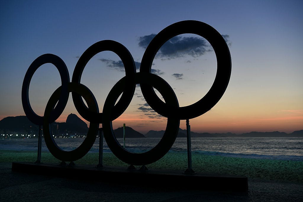 RIO DE JANEIRO, BRAZIL - AUGUST 06: The Olympics Rings at sun rise on Copabana Beach on August 6, 2016 in Rio de Janeiro, Brazil. 