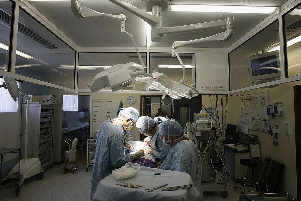 Surgeons operating at a hospital. 