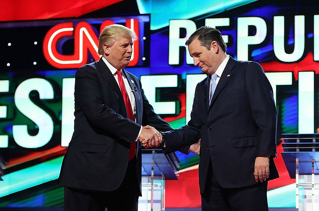 Republican presidential candidates Donald Trump and Sen. Ted Cruz (R-TX) shakes hands on stage as they arrive for the CNN, Salem Media Group, The Washington Times Republican Presidential Primary Debate on the campus of the University of Miami on March 10, 2016 in Coral Gables, Florida.