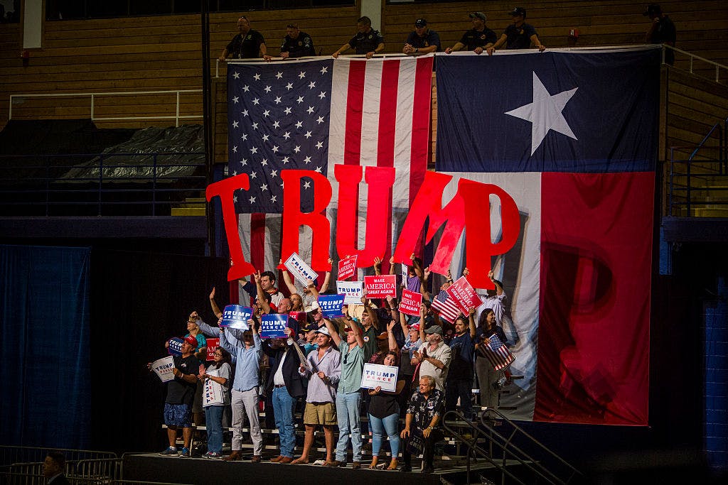 AUSTIN, TX - AUGUST 23: Supporters of Republican presidential candidate Donald Trump cheer during a rally at the Travis County Exposition Center on August 23, 2016 in Austin, Texas. 