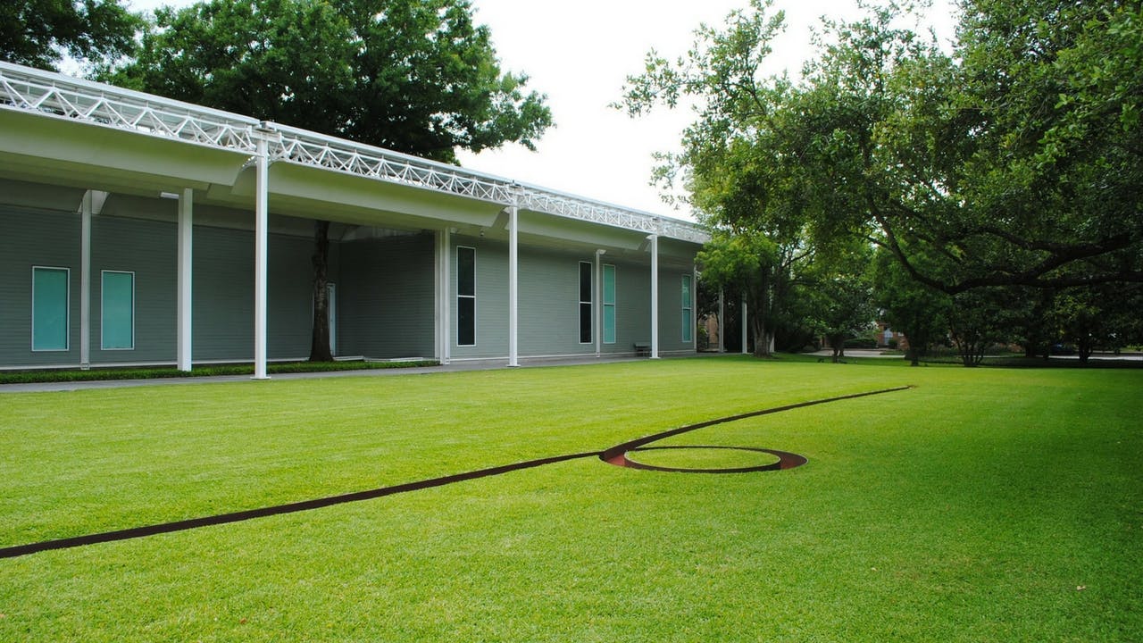 One of Michael Heizer's "earth sculptures," in front of the Menil Collection, in Houston.