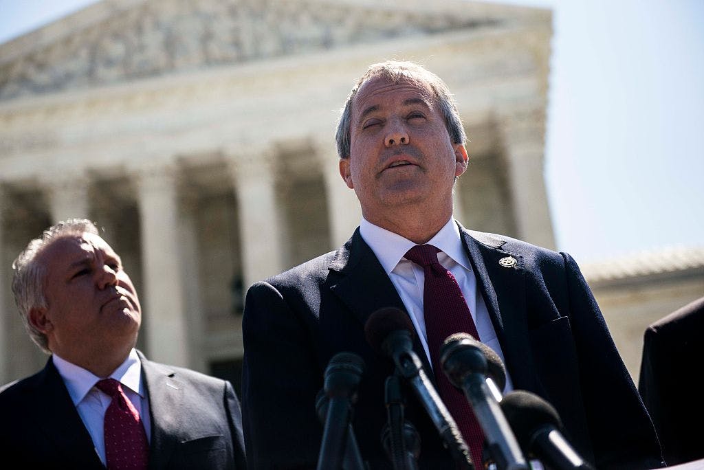 Texas Attorney General Ken Paxton speaks to reporters at a news conference outside the Supreme Court on Capitol Hill on June 9, 2016 in Washington, D.C. 