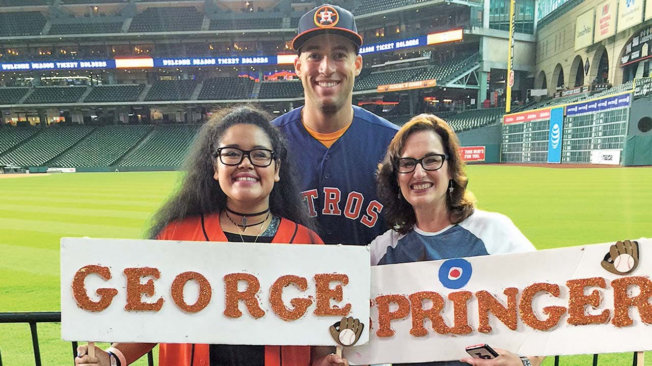 Cheryl and Kayla, with their favorite player, George Springer, in July.
