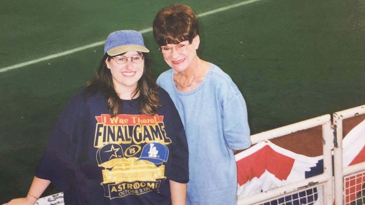 Cheryl and her mom, Florence, at the last regular-season game in the Astrodome, on October 3, 1999
